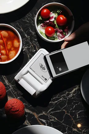 Modern restaurant payment terminal.